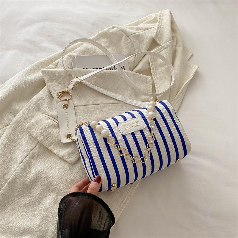 Exquisite high-end textured small bag 2025 summer new small fresh powder grid pillow bag versatile messenger shoulder bag