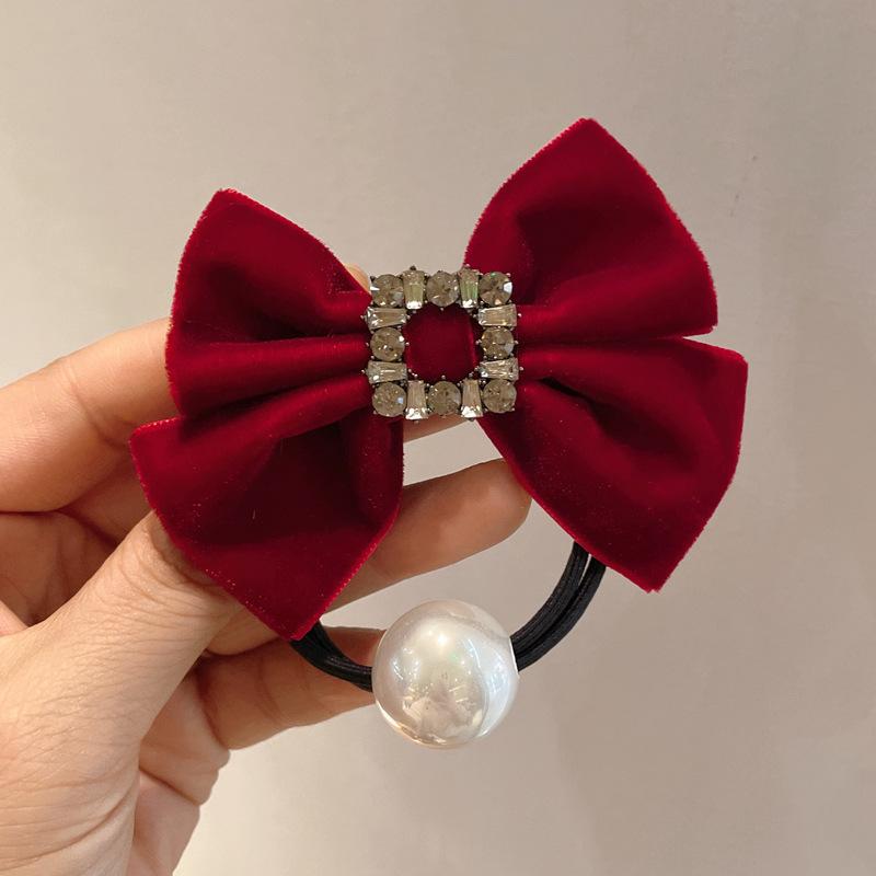 

Элегантная черная бархатная резинка для волос с бантом из страз для низких хвостов