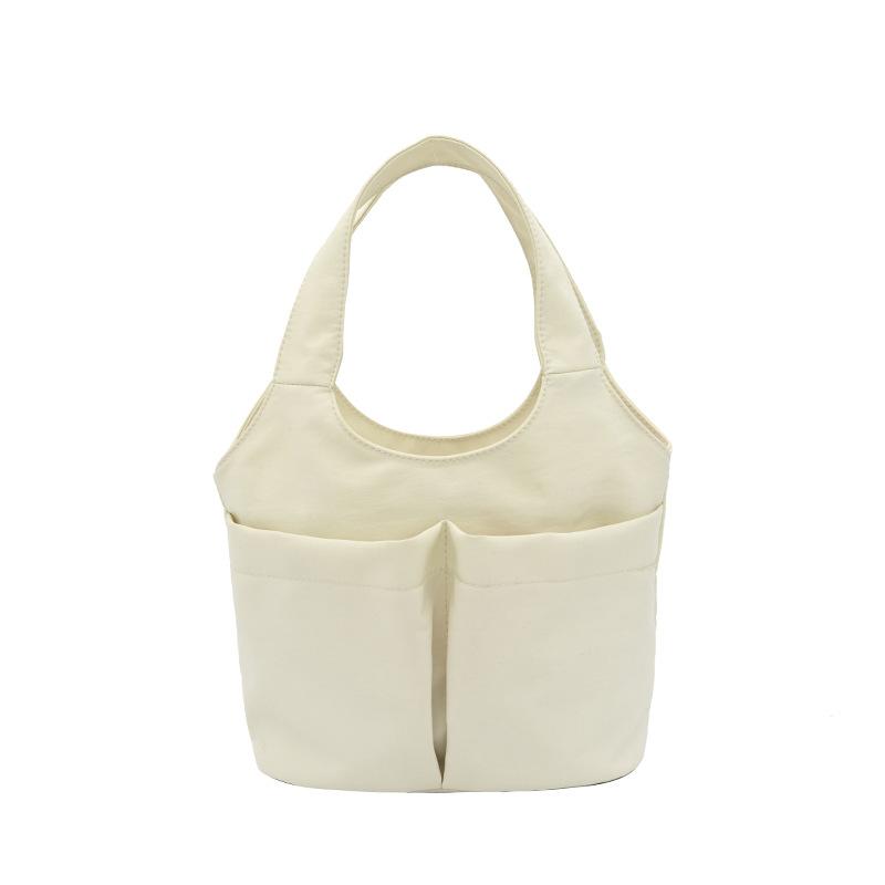 Women's casual simple solid color multipocket summer new fashion go out portable handbag