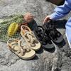 Sandalias de cuerda de cáñamo de paja para mujer, nuevo estilo de hada de verano, zapatos romanos de fondo plano, zapatos tejidos para la playa del mar