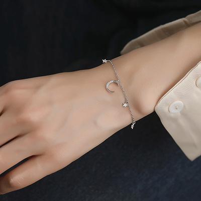 Bracelet en argent sterling argent S925 bracelet mode coréenne lune étoile bracelet doux pendentif pompon étoile à cinq branches croissant de lune bracelet
