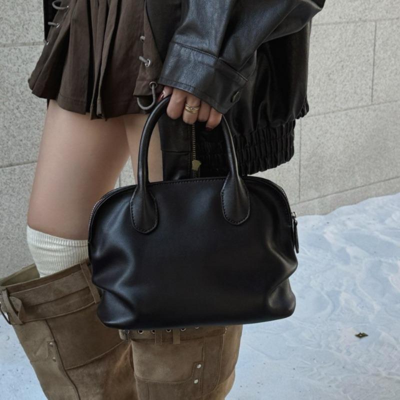 Niche design retro cowhide fashion shell handbag versatile new leather large-capacity shoulder handbag