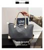 Versatile Large Capacity Casual Tote: Portable Single Shoulder Bag for Commuting or Short Trips