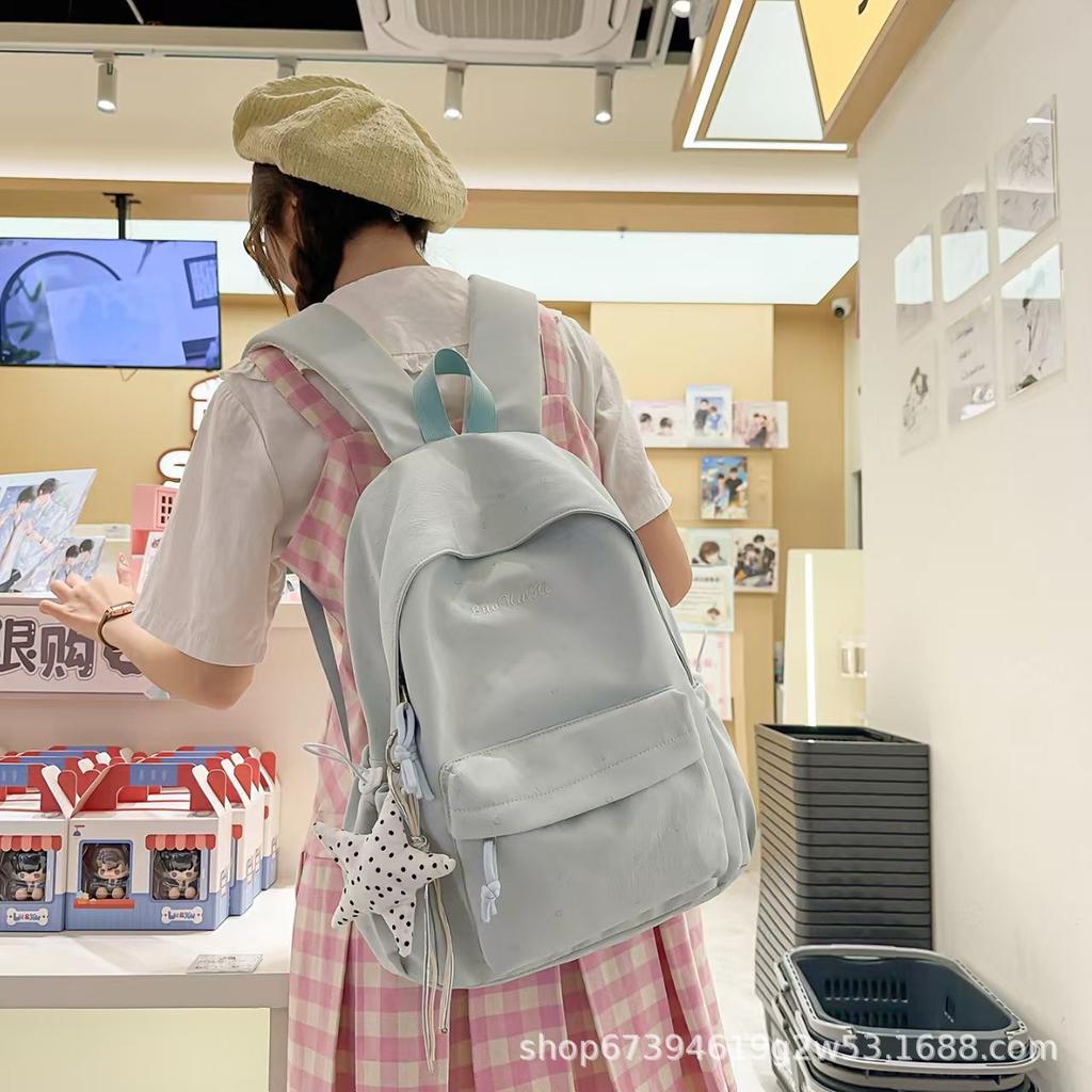 Schoolbag Korean version Sweet and cute backpack Student lightweight large-capacity schoolbag Nylon cloth water-proof junior high school backpack