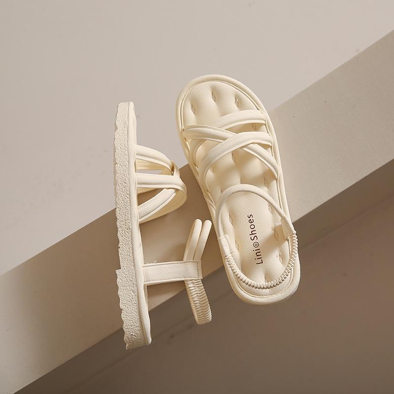 

Sandals women s new flat-soled soft-soled high-end skirt student maternity beach shoes 35