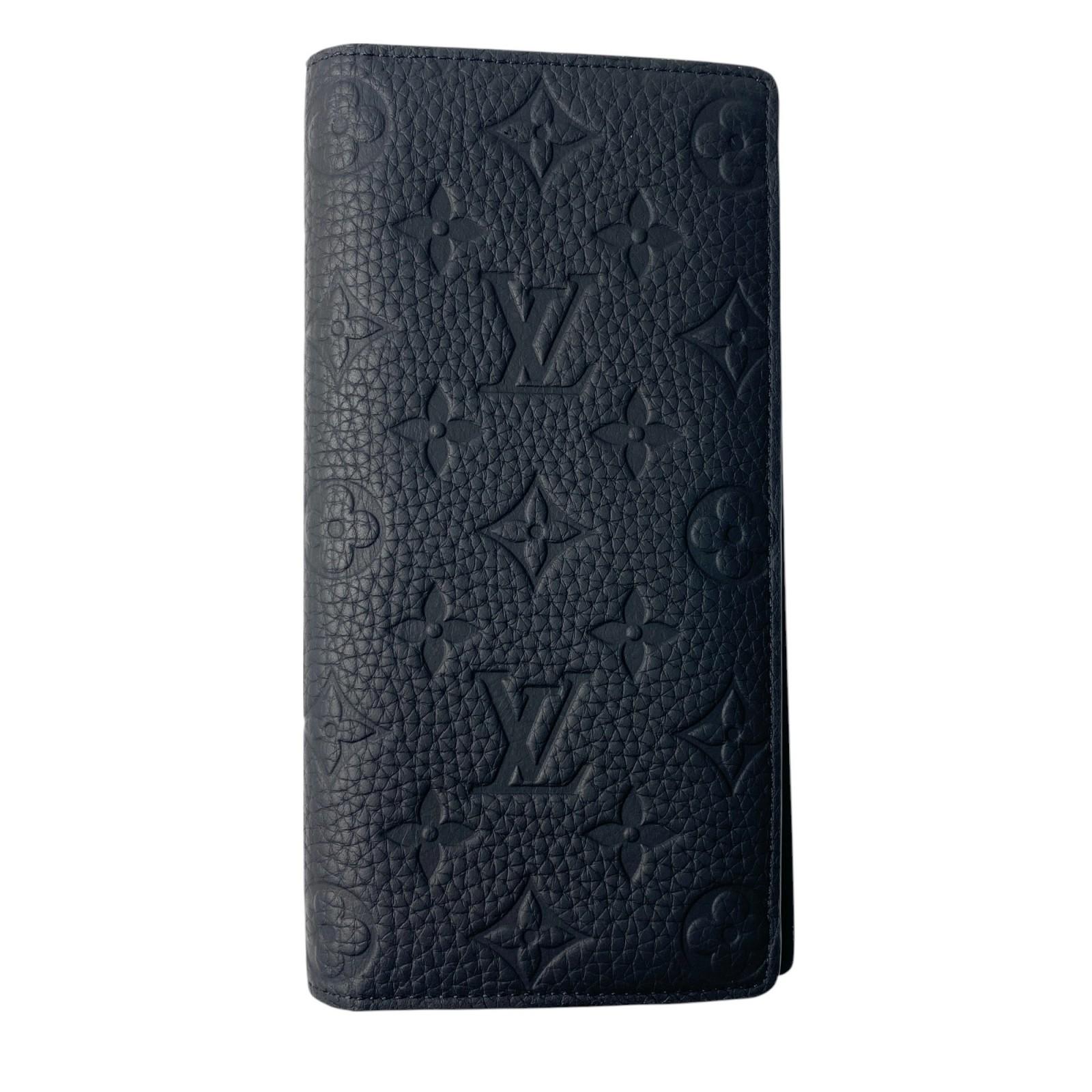 

Вживаний гаманець LOUIS VUITTON чорна шкіра чоловічий