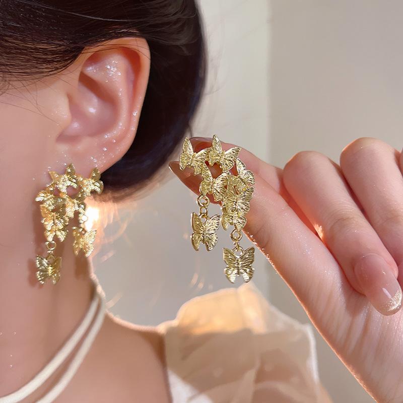 

Супер бессмертные универсальные темпераментные металлические серьги-кисточки с эффектом преувеличения в виде бабочки для женщин 1 pair золотистый