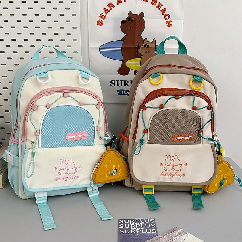 Schoolbag Korean version contrasting color cute backpack female student large capacity casual backpack light travel double backpack plush element