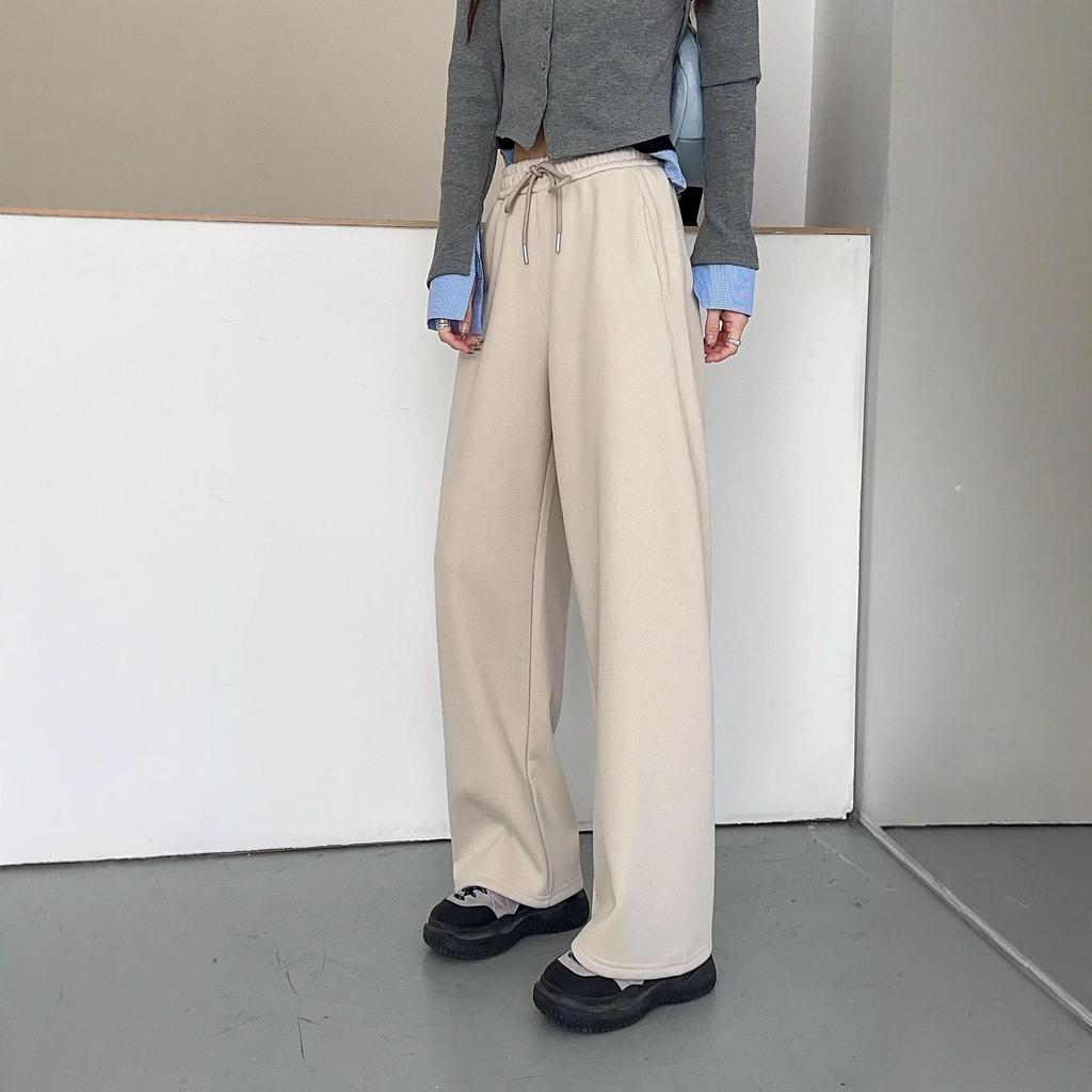 Dámské zimní ležérní tepláky s širokými nohavicemi a středním pasem, zdobené nýty