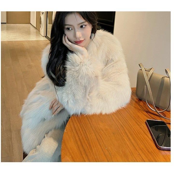 Modischer, umweltfreundlicher, einfarbiger Kunstfuchspelzmantel für Damen mit elegantem Temperament