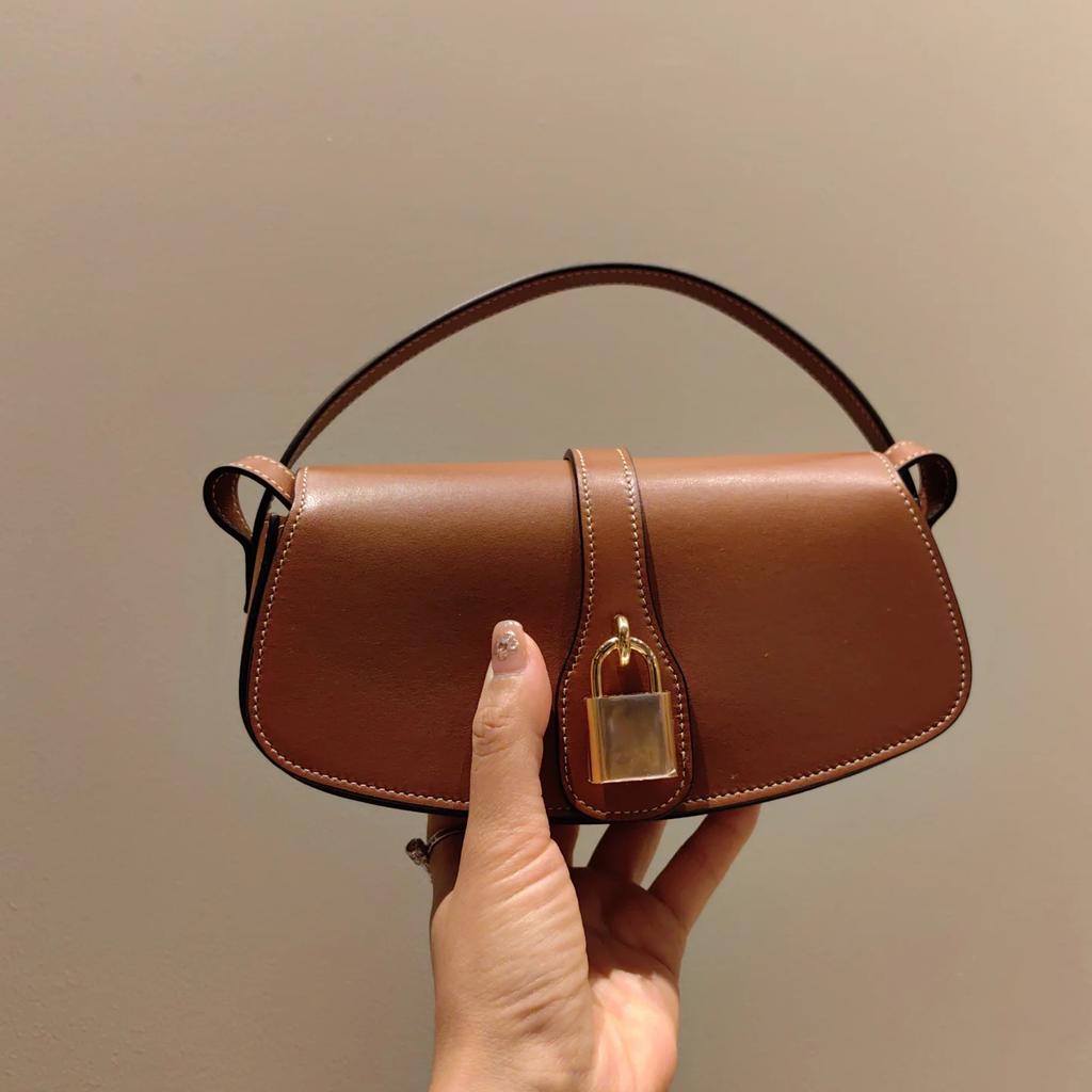 Damen Echtleder Umhängetasche Neues Schlossdesign Nische Hochwertiges Design Sattel Crossbody Ledertasche