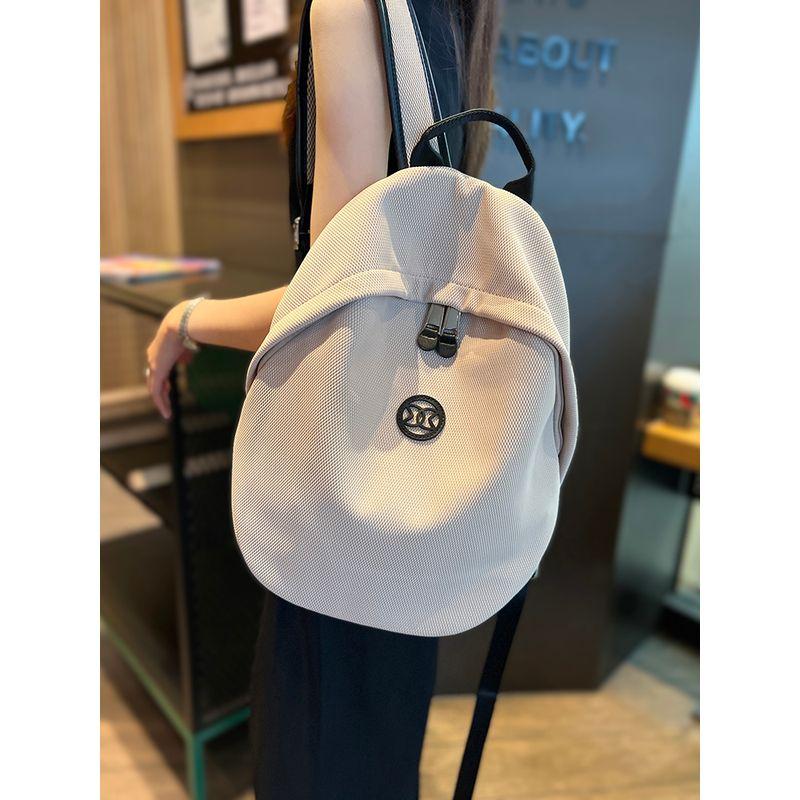 

Large Capacity Lightweight Backpack Female 2025 New Arrival Fashion Fancy Niche Style Work Clothing Canvas Casual Backpack Schoolbag Apricot