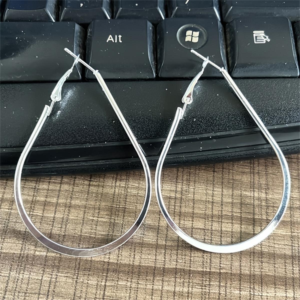 Модные серьги-кольца разного размера и дизайна — фото 3