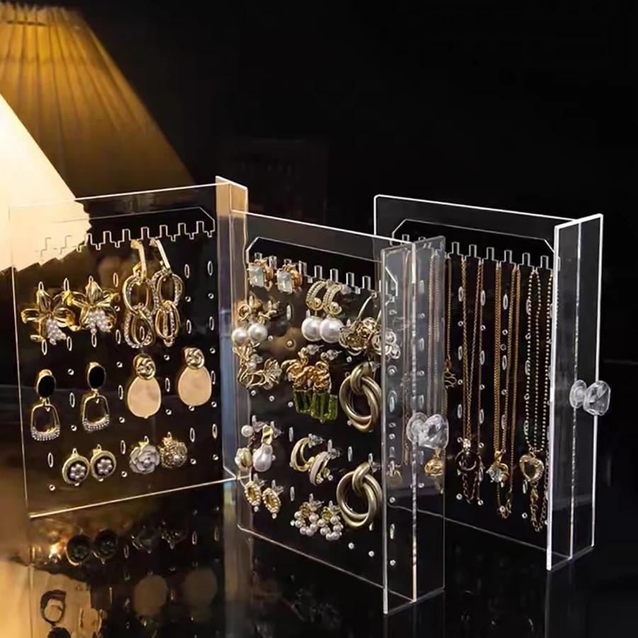 A clear earring and necklace display case, vintage plastic storage case with drawers for bracelets, rings and accessories