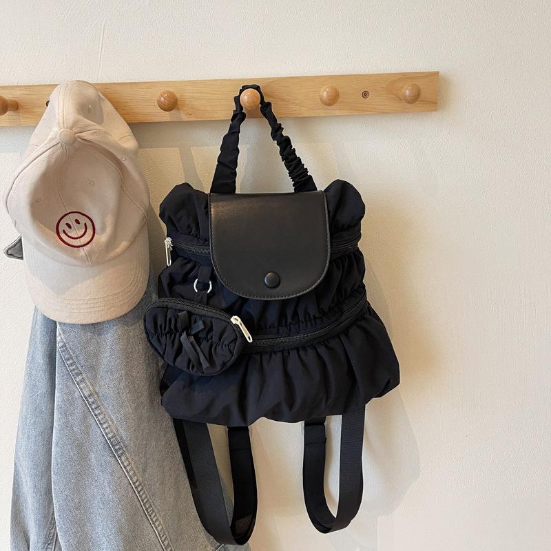 Schoolbag Korean version of college style backpack bag women's 1011 new trendy fashion pleated nylon casual portable backpack