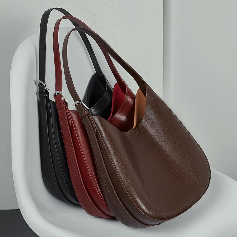 Umhängetasche, Damenhandtasche aus echtem Leder, neues Nischendesign, Halbmond-Tasche, Crossbody-Tasche, vielseitige Trendtasche