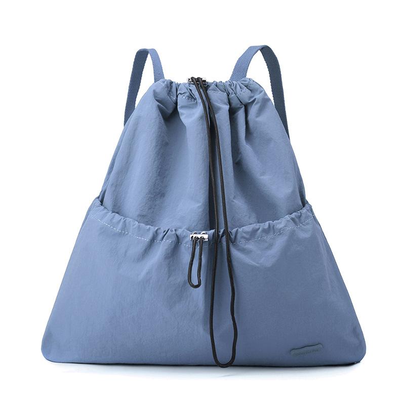 Niche daily leisure lightweight sports drawstring backpack commuter student schoolbag