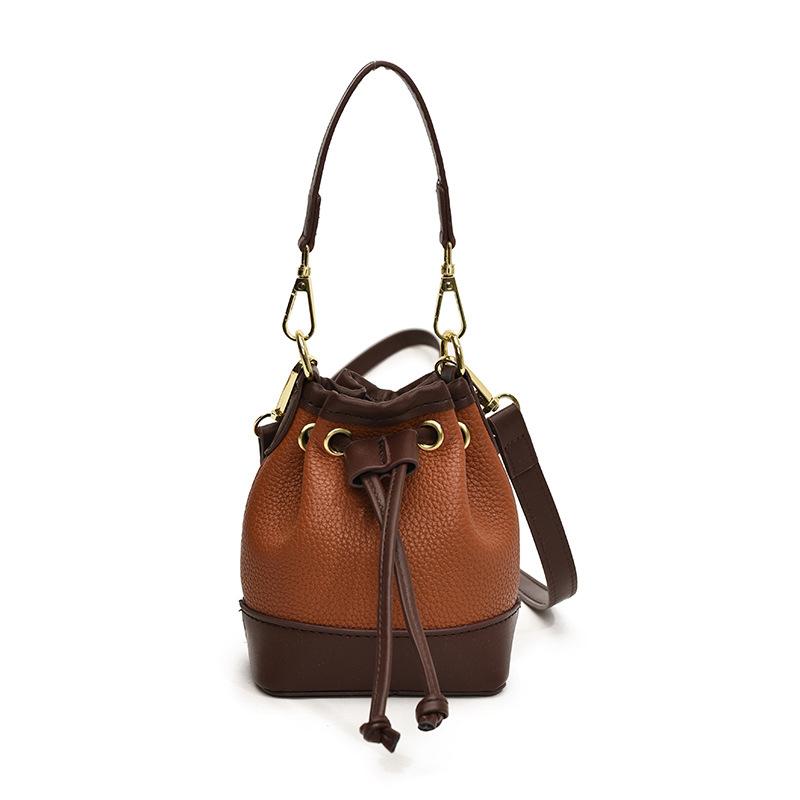 Este ano, a bolsa popular feminina 2025 nova versão coreana da moda bolsa de ombro com estampa de leopardo bolsa mensageiro portátil mini bolsa balde