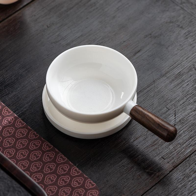 High-grade 100-hole Suet Jade Porcelain Tea Leak Wood Side Handle Light Luxury Integrated Tea Filter Household Chinese Ceramic Tea Set