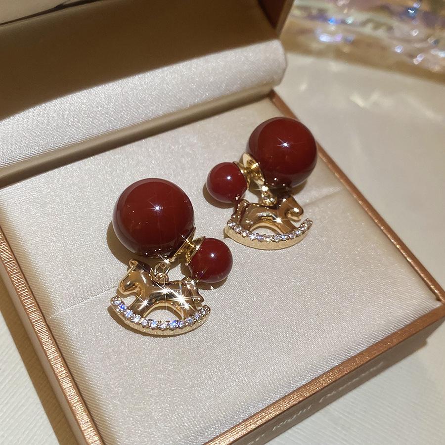 18K real gold electroplated silver needle zircon pony pendant earrings, new Chinese retro natal year earrings, light luxury earrings.