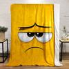 Yellow background with a sad cartoon face featuring droopy eyes and frown. for all seasons blanket lunch break throw gift