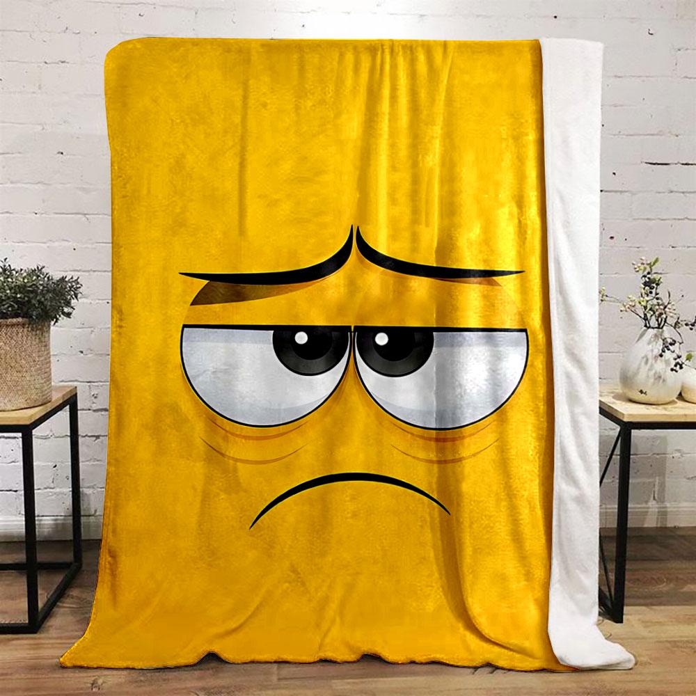 Yellow background with a sad cartoon face featuring droopy eyes and frown. for all seasons blanket lunch break throw gift