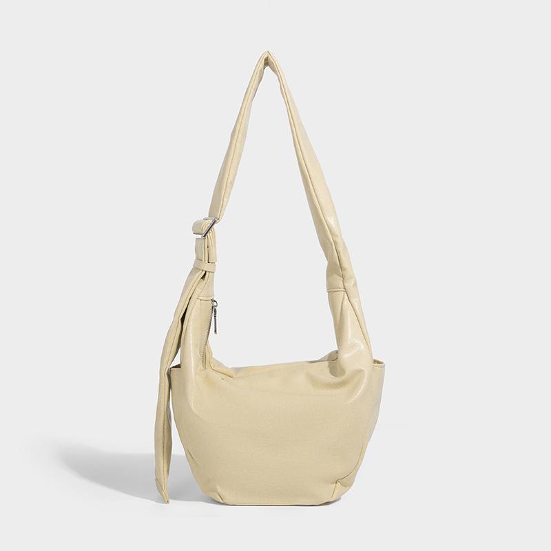 

Новая 2025 супер огненная нишевая сумка большая вместимость сумка-круассан простая универсальная сумка-мессенджер женская сумка модная сумка-пельмень хаки