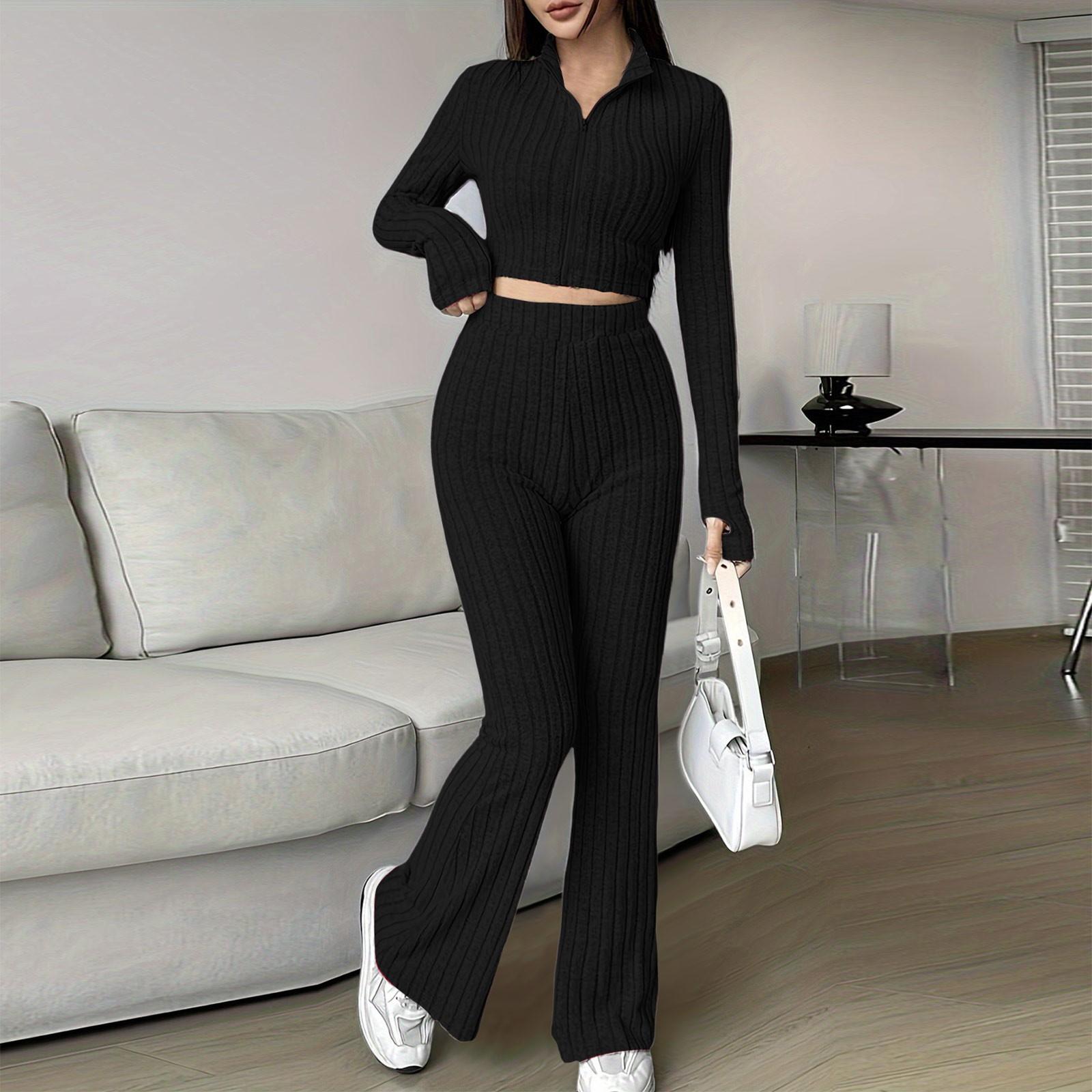

Женский модный однотонный ребристый костюм из двух частей с застежкой-молнией, коротким топом с длинными рукавами и расклешенными брюками с высокой талией XL чёрный