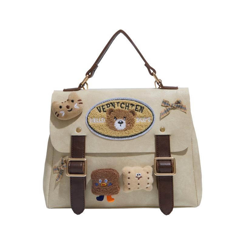 Schoolbag Korean version backpack bag women's American retro handbag 1011 spring new cute letter bear casual bag women