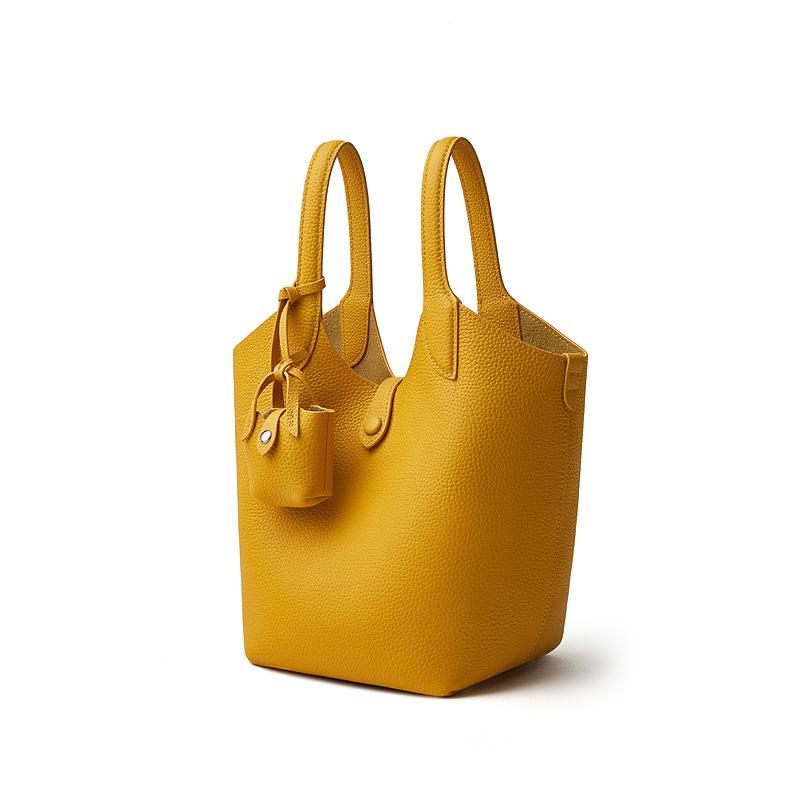 Light Luxury Small Crowd Design Handbag Canvas Bag Genuine Leather And New High-grade Sense All-match Casual Bucket Bag Women's Bag