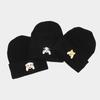 Cute puppy head sticker knitted hat autumn and winter street fashion crimped pullover black hat