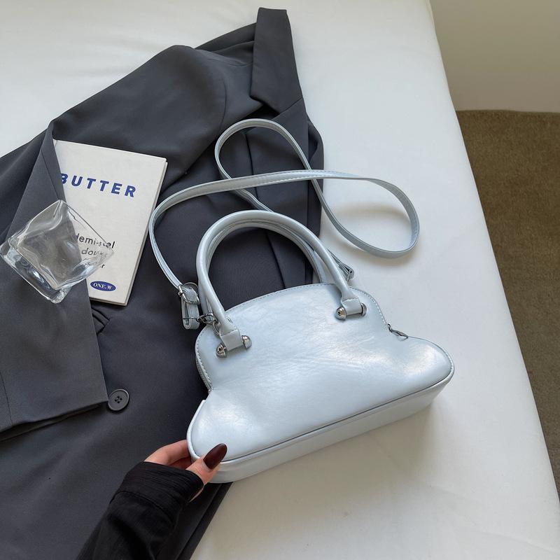 Premium sense niche bag women's spring summer 2025 new fashion simple messenger bag women's portable bowling bag