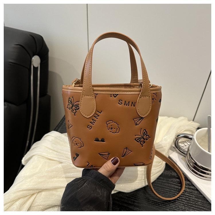 Минималистичная женская сумка-ведро в западном стиле - Лето 2025, кроссбоди