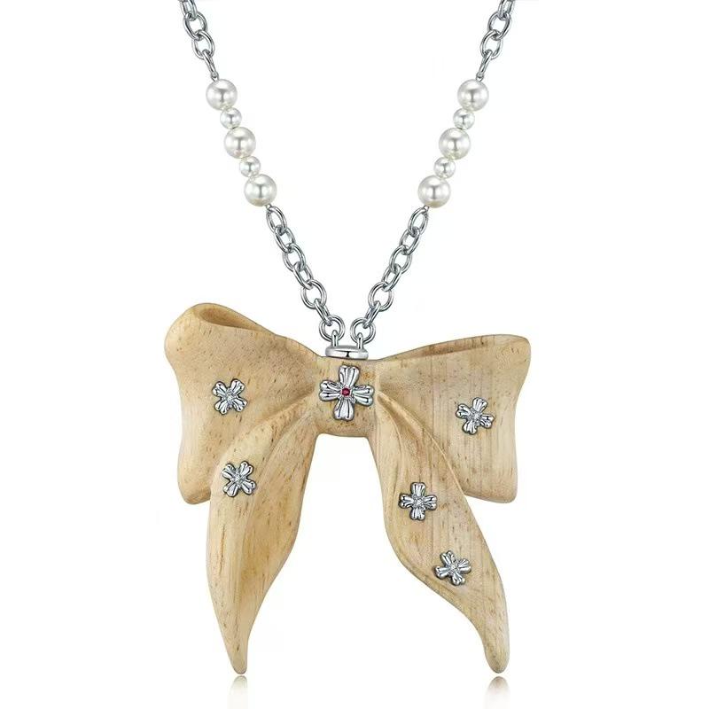 Retro Bow Sandalwood Pendant Necklace: Stylish & Versatile