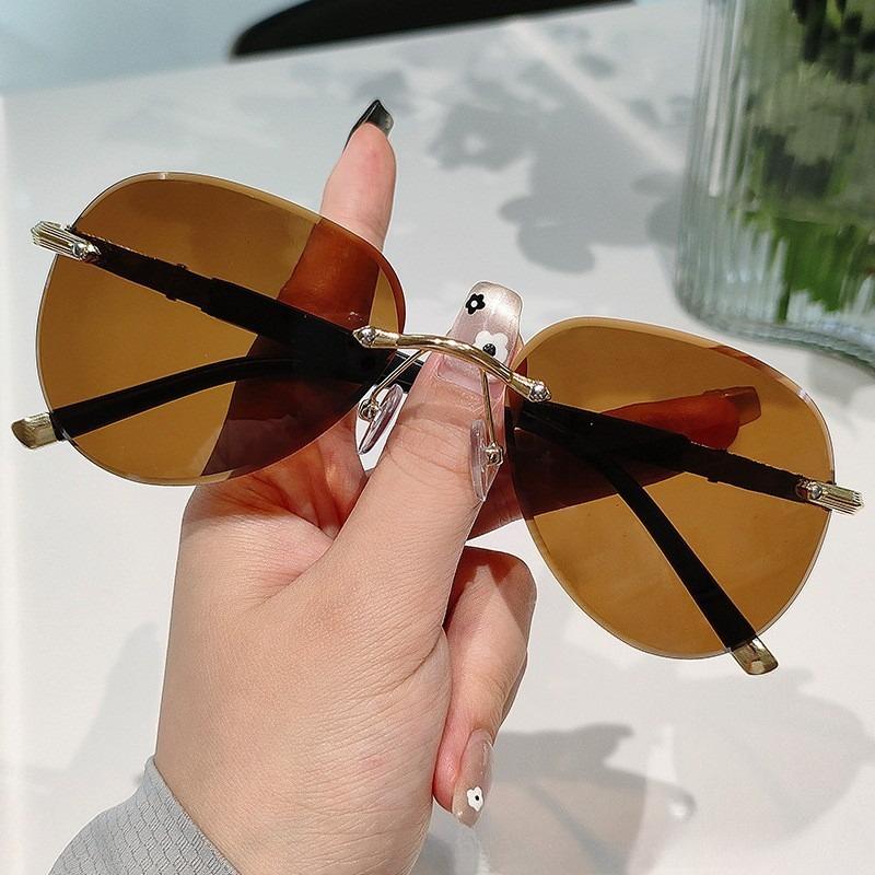 

Vintage and Personalized New Frameless Women s Sunglasses for Outdoor Fashion Neutral and High-quality UV400 Sunscreen Glasses As Picture