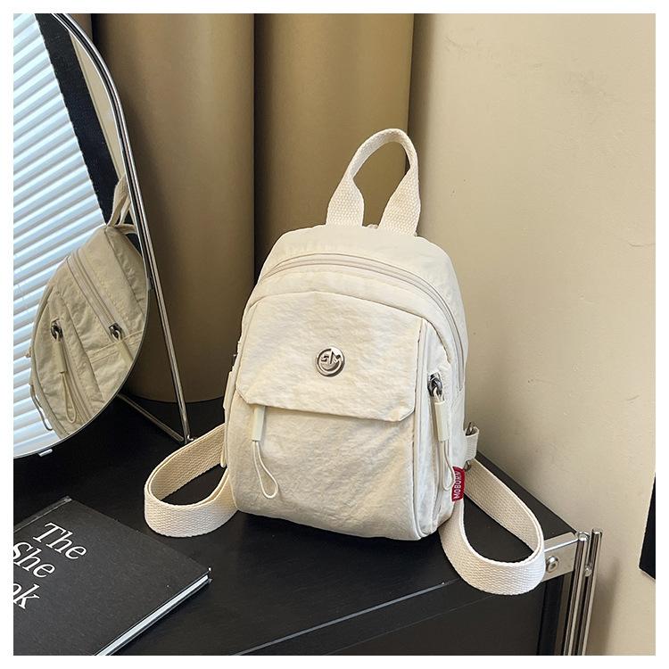 Schoolbag custom logo new niche design backpack women's simple versatile large capacity casual high value backpack