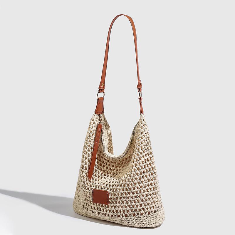 Tasche Luxus Nische High-End Gewebte Hohltasche für Damen Fauler Stil Häkeln Einzelne Schulter Pendlertasche Damen Strohtasche