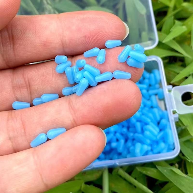 100Pcs/Lot Anti-Tangling Rubber Fishing Float Blue Oval Stopper Fishing Float Space Beans Seatool Fishing Bobber Accessories