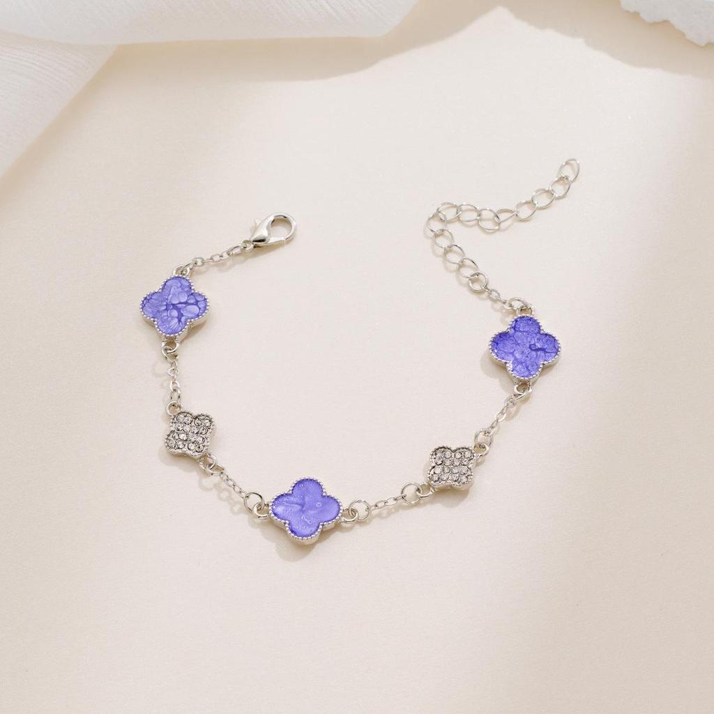 Bransoletka Koniczynka Czterolistna z Cyrkoniami - Elegancki, Luksusowy Niszowy Design