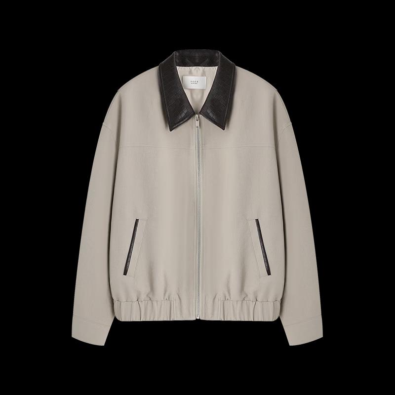 Veste courte à revers en cuir tressé pour femme