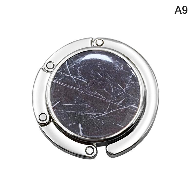 Runder, tragbarer, faltbarer Taschenhaken aus Metall, Handtaschenaufhänger, Aufbewahrungshalter für Damentaschen für den Innen- und Außenbereich im Bürotisch