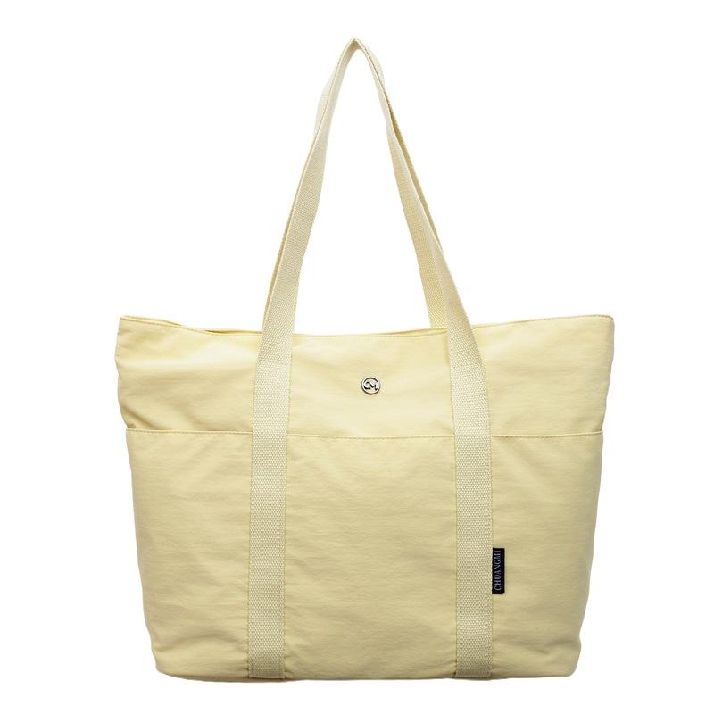 2025 new leisure commuting large-capacity commuting shoulder tote bag fashionable versatile solid color simple handbag