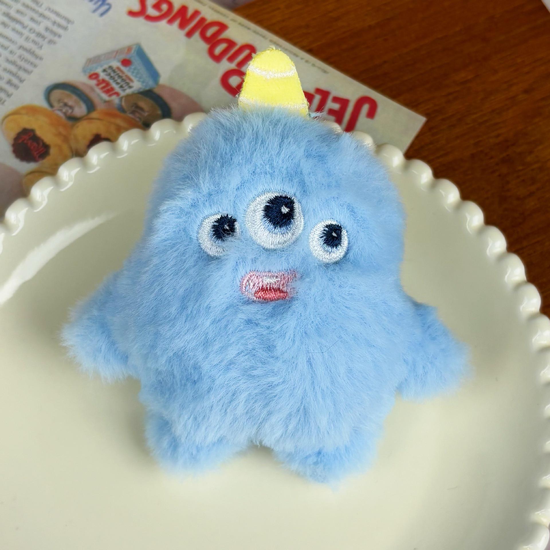 

Мультяшный плюшевый брелок-маленький монстр: Кулон в виде куклы одноглазого и трехглазого монстра.