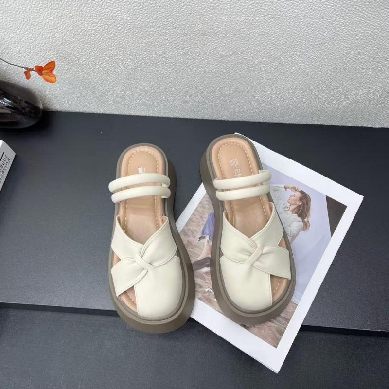 Fashion outer wear bag head design sense niche platform slippers women's summer new non-slip skirt platform shoes