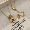 Exquisite Zirconia Flower Pendant Necklace with Round Ring and Sweater Chain - Light Luxury Petal Collarbone Accessory.