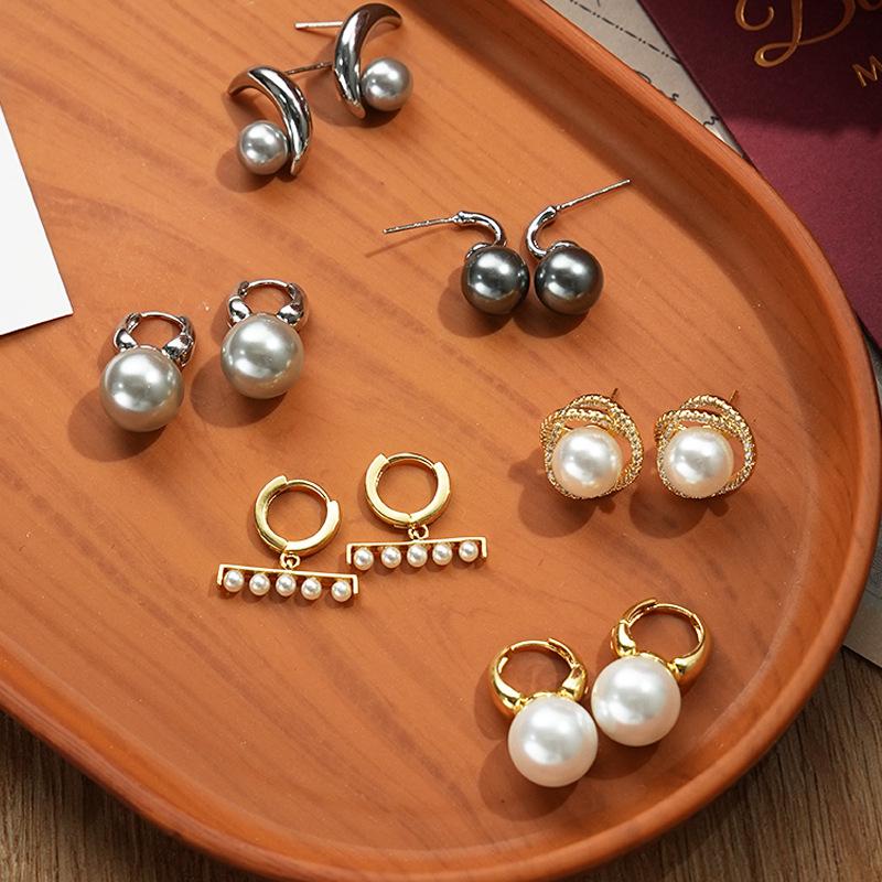 

Серьги из серебряной иглы S925 с винтажным жемчугом - Элегантный дизайн с круглыми бусинами для женщин 2024