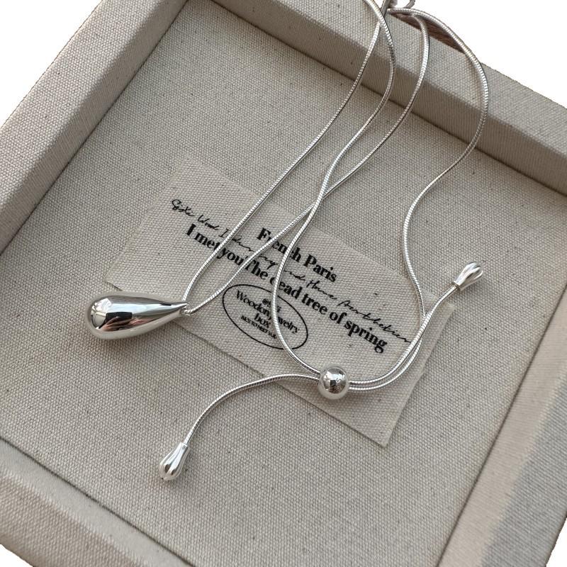 Elegant Pull-Out Water Drop Necklace for Women - Fashionable, Versatile, and Simple Luxury Sweater Chain