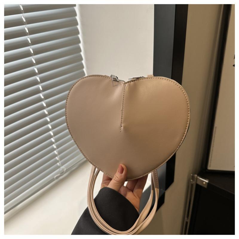 New fashion personality sub-shell love foreign style solid color small peach heart cute personality trendy shoulder messenger women's bag