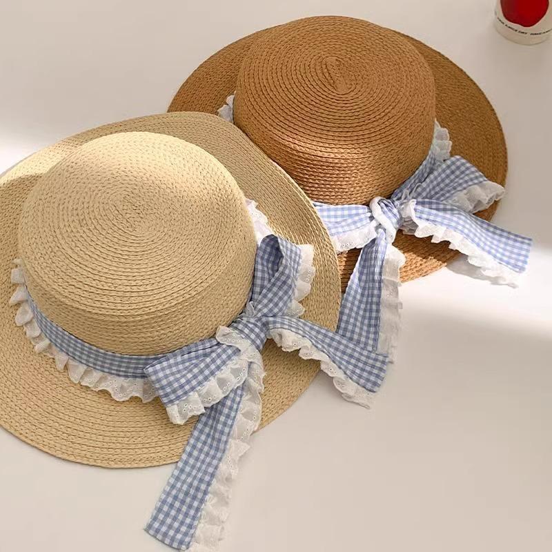 Korean Version Spring and Summer Flat Top Top Top Hat Seaside Travel Vacation Sun Protection Beach Hat Bow Strap Straw Hat