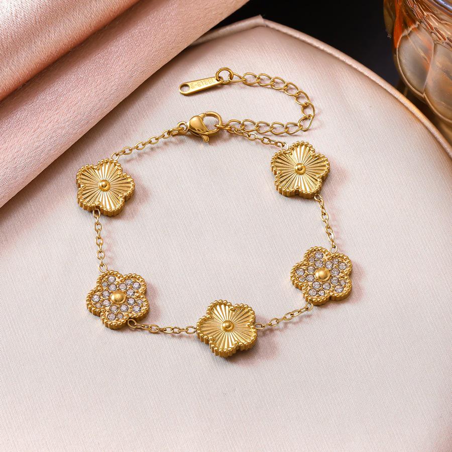 Elegant Five-Petal Rhinestone Flower Jewelry Set: 18K Gold-Plated Bracelet, Necklace & Earrings